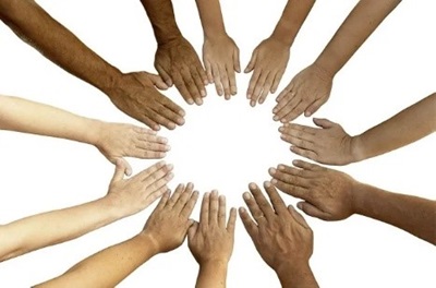 multicolored hands in a circle